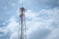 Transmission tower against sky and clouds Royalty Free Stock Photo