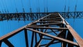 Transmission tower close-up against a blue sky Royalty Free Stock Photo