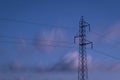 Transmission tower or electricity pylon and overhead power line in long exposure Royalty Free Stock Photo