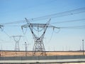 A transmission tower, electricity pylon which is a tall steel lattice structure that used to support overhead high voltage power Royalty Free Stock Photo