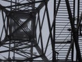 Transmission tower silhouette in deep mist white background Royalty Free Stock Photo