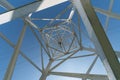 Transmission tower, view from below. Overhead pylon power line tower, distribution and transmit electrical energy across large Royalty Free Stock Photo