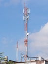 Transmitter and cellular tower on roof top Royalty Free Stock Photo