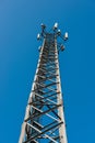The Transmitter mast against blue sky Royalty Free Stock Photo