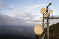 Transmitters and aerials on the telecommunication tower during sunset Royalty Free Stock Photo