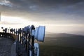 Transmitters and aerials on the telecommunication tower during sunset Royalty Free Stock Photo