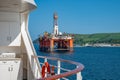 Transocean Leader oil platform with cruise ship in front at Invergordon during clear sky Royalty Free Stock Photo