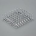 Transparent acrylic storage box with a grid pattern, featuring evenly spaced square Royalty Free Stock Photo