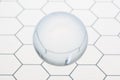 Transparent ball sphere flying on an honeycomb glass pattern with copy space for your text