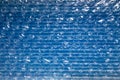 Transparent blue plastic bubble wrap for packaging shipping and transport security protect from hits or dents