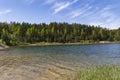 Transparent blue water in a Dubkalnu Reservoir at Zilie Kalni (Blue Hills) Nature Park in the Ogre municipality