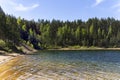 Transparent blue water in a Dubkalnu Reservoir at Zilie Kalni (Blue Hills) Nature Park in the Ogre municipality, Latvia