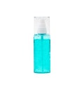 Transparent bottle of green color with after shave gel for men on a white background, isolate