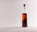 Transparent bottle of homemade chilli oil with pieces of dry chilli, on a white background