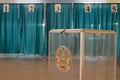 Qazaqstan, June 9, 2019, Transparent box with the emblem of Kazakhstan. Presidential elections. Voting room on the background of