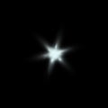 Transparent bright star isolated on black background. Sparkling realistic white, light effect. Glitter or sparkle. Glowing Royalty Free Stock Photo