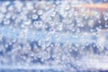 Transparent bubbles in the gel liquid. Light blue background