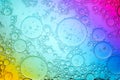 Transparent bubbles on rainbow background