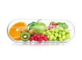 Transparent capsule with fruits and berries rich in vitamins on white background