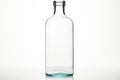 Transparent clean empty Glass bottle without cap isolated on white background. Mockup, template for design. With copy Royalty Free Stock Photo