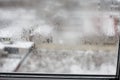 Transparent condensate in the foggy background, water dripping on clear glass. Drops of condensation close-up macro. Steam on the Royalty Free Stock Photo