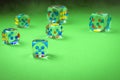 Transparent cubes for casino/transparent cubes for casino on a green cloth. Copy space