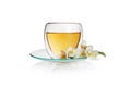 Transparent cup of green tea with jasmine flowers isolated on white background Royalty Free Stock Photo