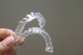 Transparent dental orthodontics to correct dental alignment