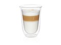 Transparent double wall glass mug with latte coffee isolated