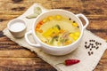 Transparent duck broth with dumplings and vegetables. Traditional bouillon, healthy food Royalty Free Stock Photo