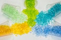 Transparent dyed plastic granulates Royalty Free Stock Photo