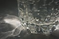 transparent faceted glass with bubbly water Royalty Free Stock Photo