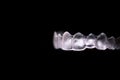 Transparent ferule retainer teeth alignment Royalty Free Stock Photo