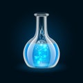 Transparent flask with magic blue liquid on black Royalty Free Stock Photo