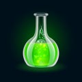 Transparent flask with magic green liquid on black