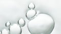 Transparent cosmetic gas bubbles in low angle on white background