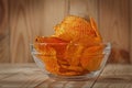 Transparent Glass Bowl Of Potato Chips With Paprika Royalty Free Stock Photo