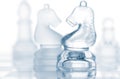 Transparent glass chess pieces Royalty Free Stock Photo