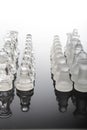 Transparent glass chess pieces Royalty Free Stock Photo