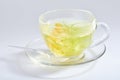 Transparent glass cup of tea with linden isolated Royalty Free Stock Photo