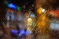 On transparent glass, drops of water flow down from the rain from the street. Royalty Free Stock Photo