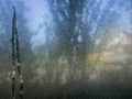 Transparent glass in drops of water. Misted window. Wet glass surface. Abstract background, texture for wallpaper Royalty Free Stock Photo