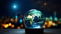 Transparent Glass globe in bulb holder at night with copy space. Earth Day April 22. Environment Day June 5. Energy saving concept