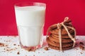 Transparent glass of milk and cookies on a white background Royalty Free Stock Photo