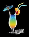 A transparent glass with a multi-colored refreshing cocktail, decorated with a cocktail umbrella and a slice of lemon, on a white