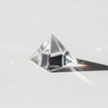 Triangular faces, a square base, and sharp edges, creating a prismatic Royalty Free Stock Photo