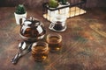 Transparent glass teapot black tea and glass cups Royalty Free Stock Photo
