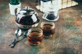 Transparent glass teapot black tea and glass cups Royalty Free Stock Photo