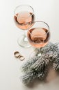 Transparent glass of wine. Pink wine. Festive mood. Alcohol for a group of friends. Delicious drink. Light background. Noble drink Royalty Free Stock Photo