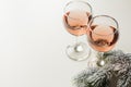 Transparent glass of wine. Pink wine. Festive mood. Alcohol for a group of friends. Delicious drink. Light background. Noble drink Royalty Free Stock Photo